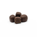 Pieces of Ginger coated in dark chocolate.